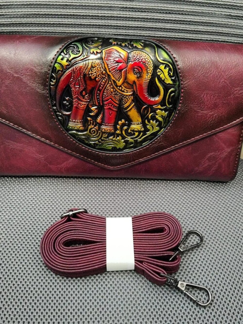 Maroon Women's Leather Clutch Or Crossbody with Embossed Elephant Accent